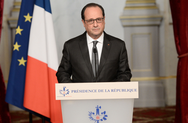 French President Francois Hollande speaks at the Elysee Palace in Paris, Saturday, Nov. 14, 2015, following a series of coordinated attacks in and around Paris late Friday which left more than 120 people dead. 