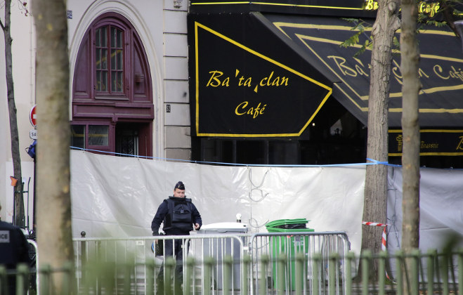  police officer stands guard outside the Bataclan concert hall, Saturday, Nov. 14, 2015