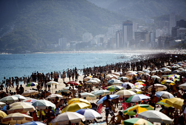 Weekend crowds gather on Ipanema Beach.