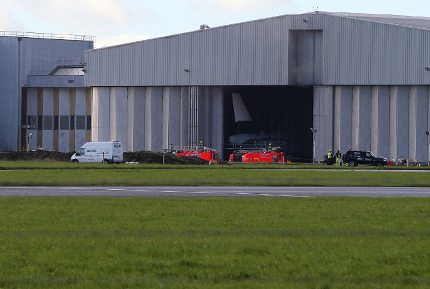 Emergency services outside a hangar at Dublin Airport, after flights were suspended following a blaze. 