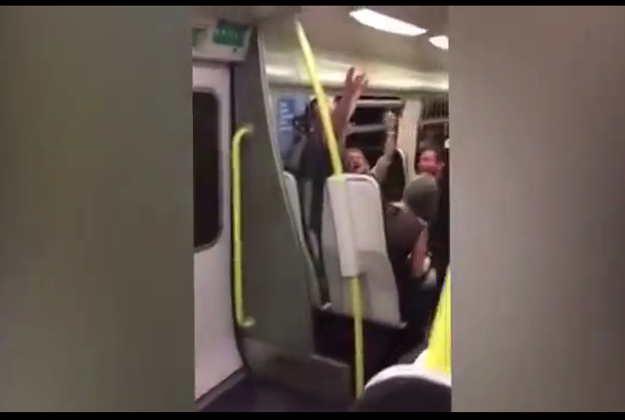 Strangers burst into song on a train in Liverpool, England.